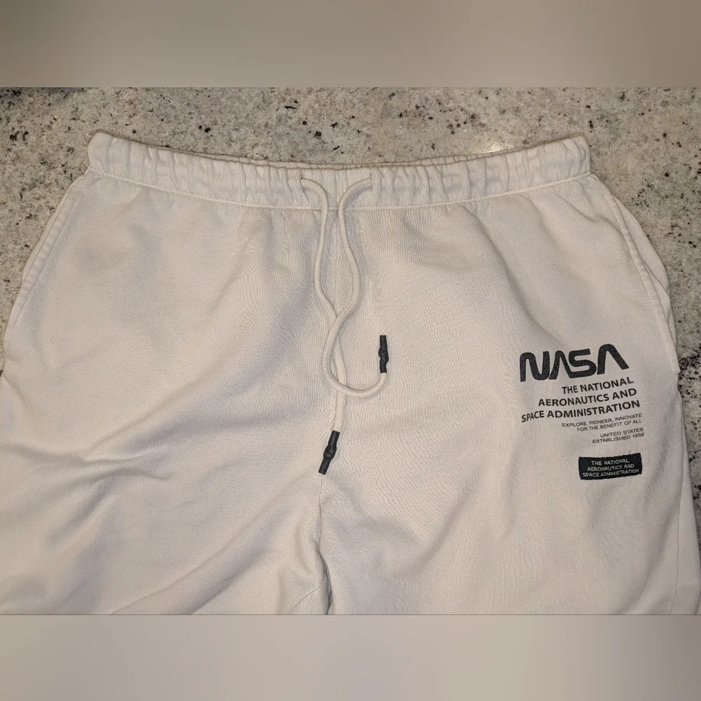 H&M NASA Graphic Joggers Cream Fleece Sweatpants Size L Space Logo